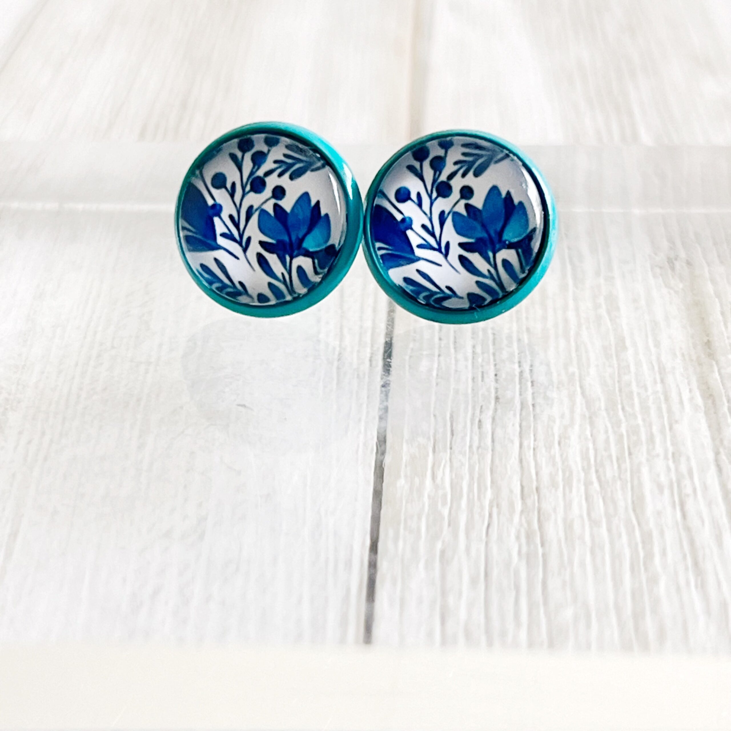 0015C06E-2FBF-4BBD-8E50-0C880F0DEB33 Blue Floral Stud Earrings – Round Botanical Jewelry in Teal Bezel - Image 6