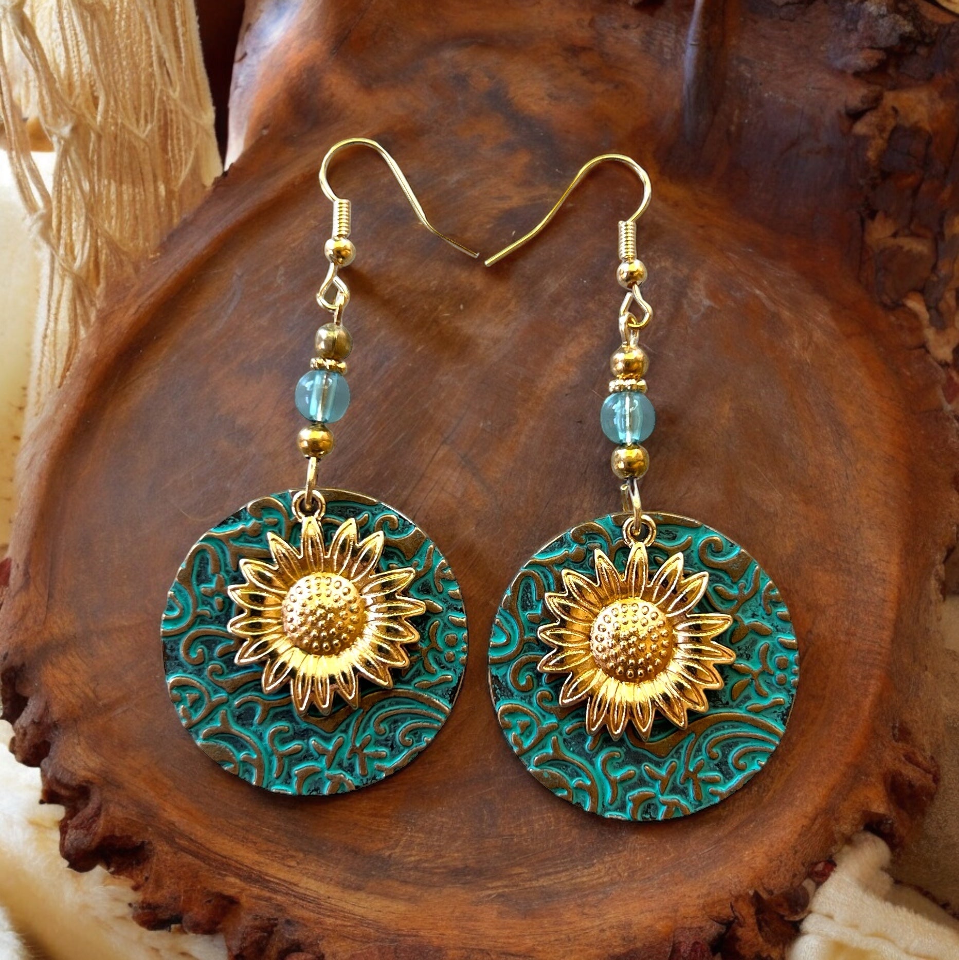 3DDB6945-33F0-4F44-98C5-FED506DE17A9 Patina Metal Dangle Earrings – Gold Sunflower Design