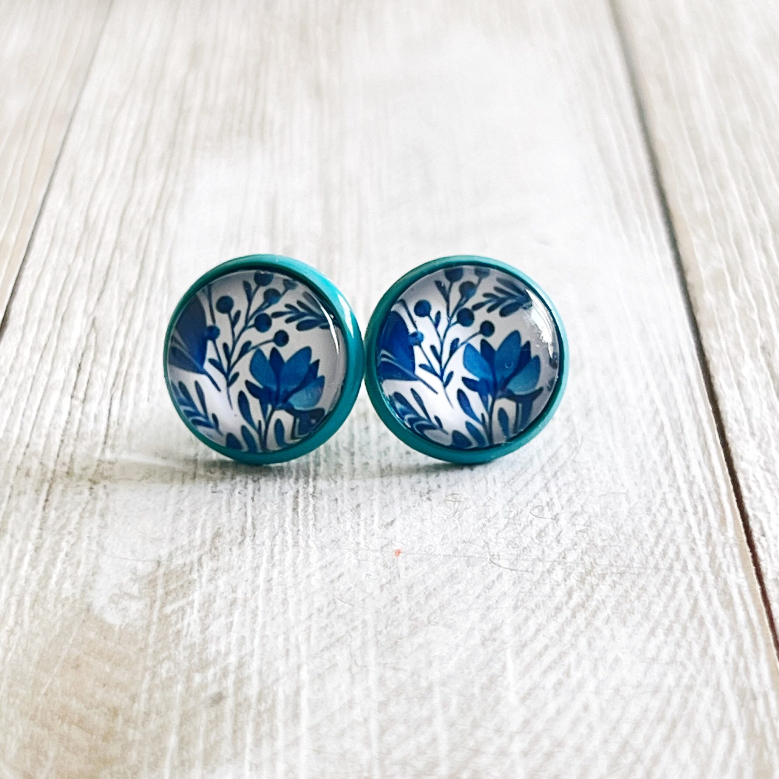 63465F7E-059D-4624-B8CB-FB51BE8692B4 Blue Floral Stud Earrings – Round Botanical Jewelry in Teal Bezel - Image 4