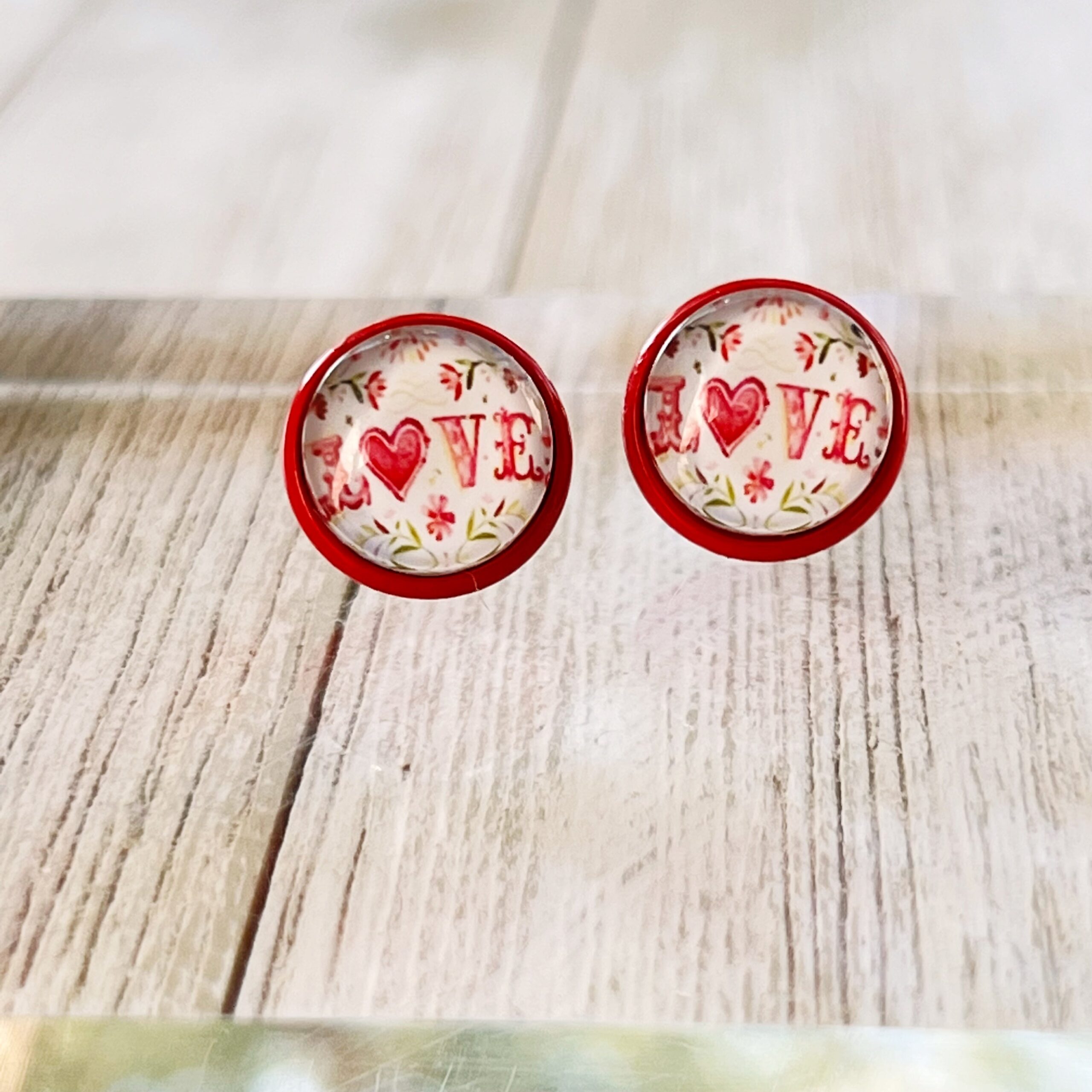 image_8ca1b8e2-ffc5-447b-8b3e-aa0de6ffd829 Pink Floral & Heart Red Stud Earrings: Expressive Accents with the Word 'Love’ - Image 13