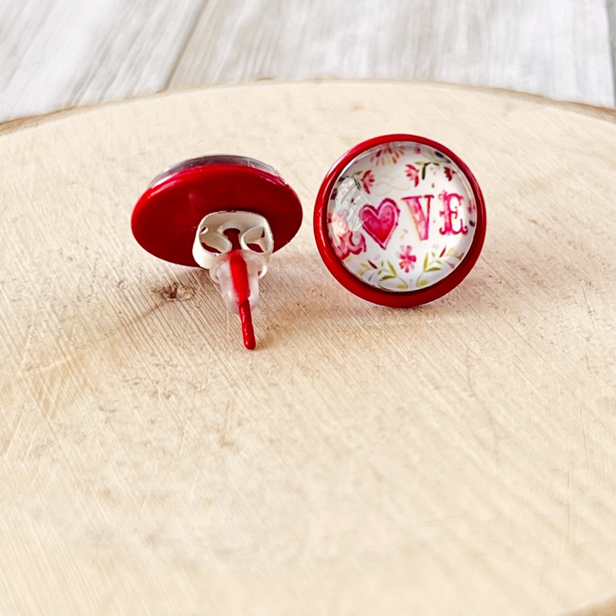 image_c6e95238-03c4-43b3-a2a7-d01842dc8ee2 Pink Floral & Heart Red Stud Earrings: Expressive Accents with the Word 'Love’ - Image 10