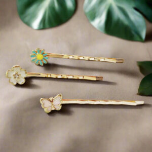 pink butterfly flower hair pins flatlay