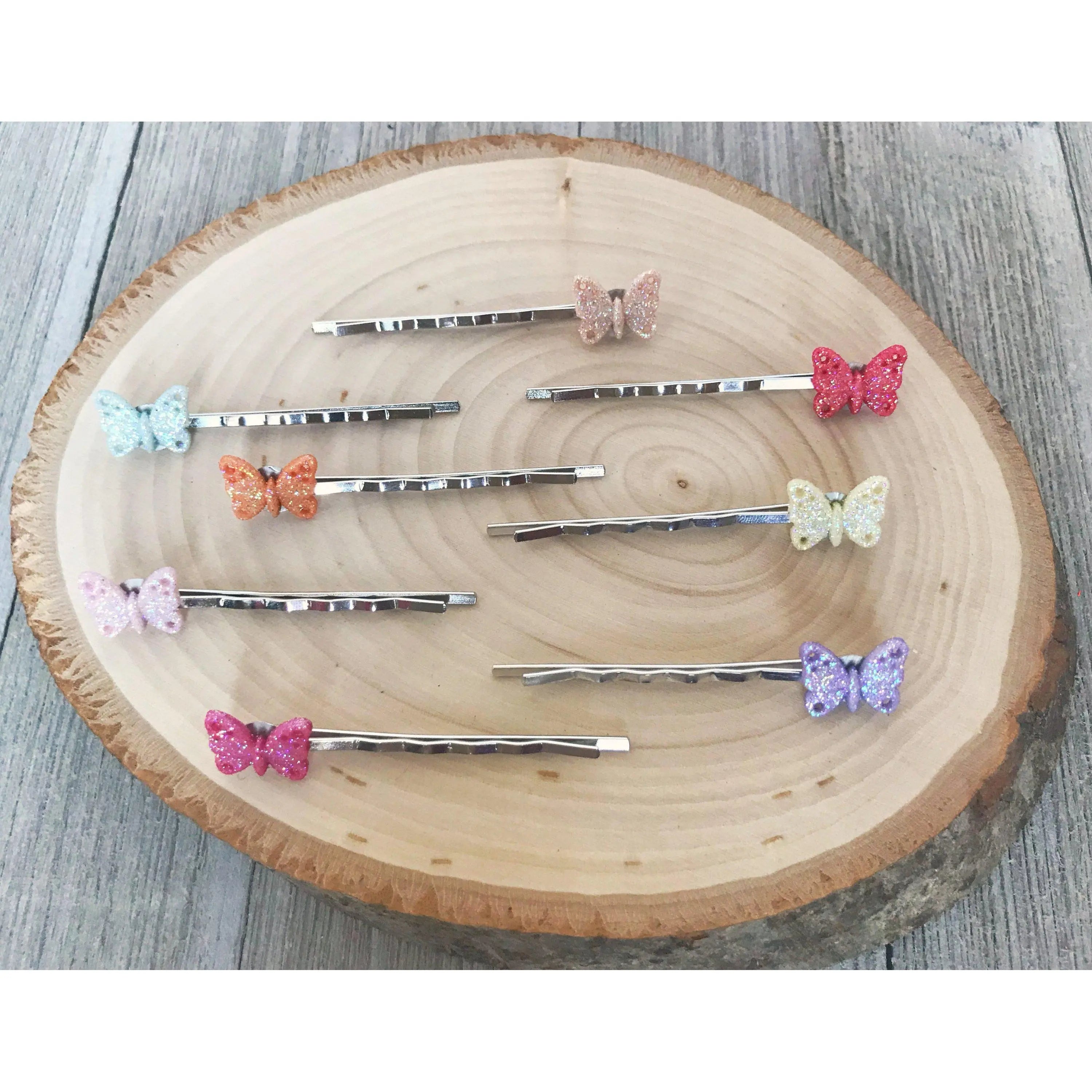 silver butterfly hair clips styled flatlay silver butterfly hair clips styled flatlay