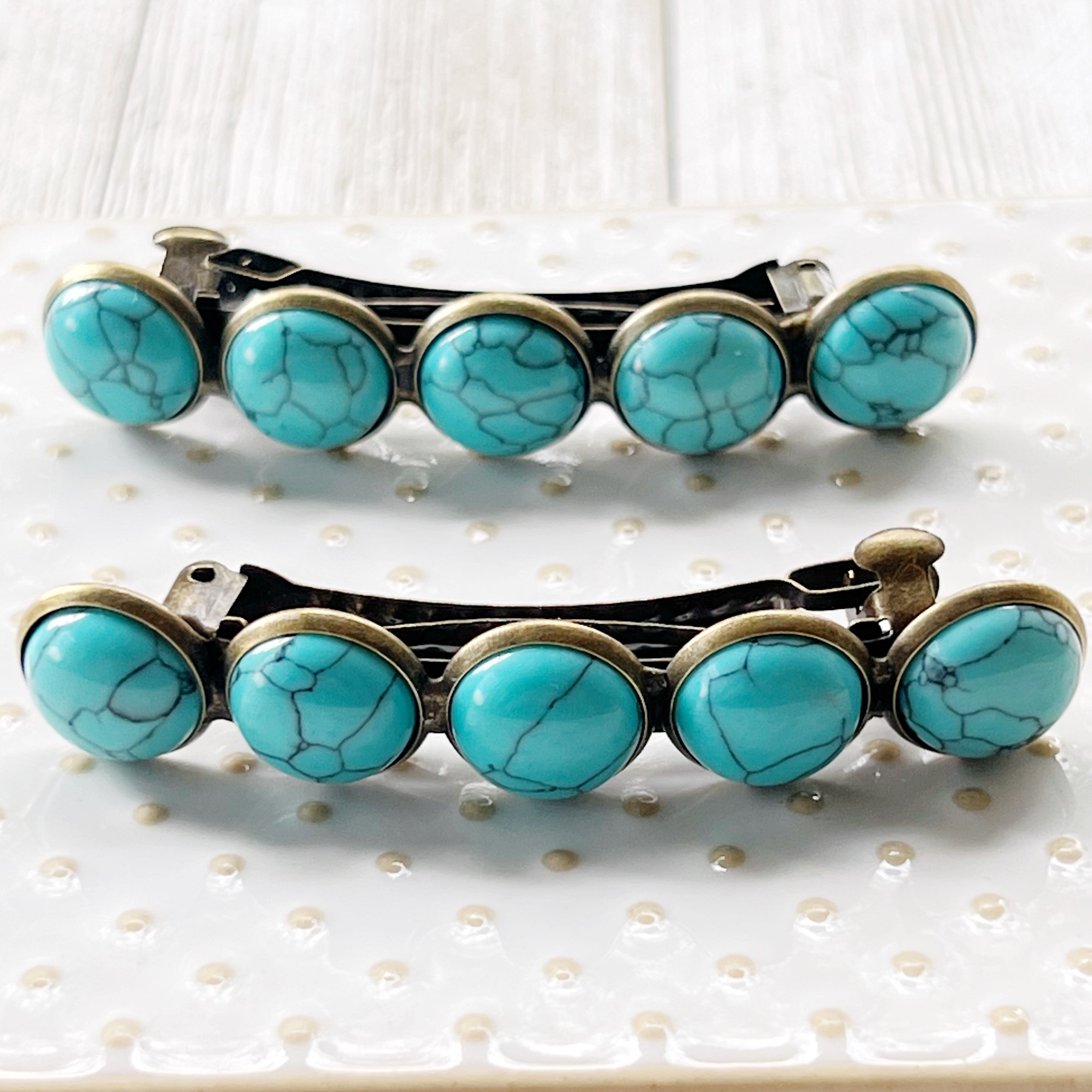 turquoise hair barrettes close up turquoise hair barrettes close up