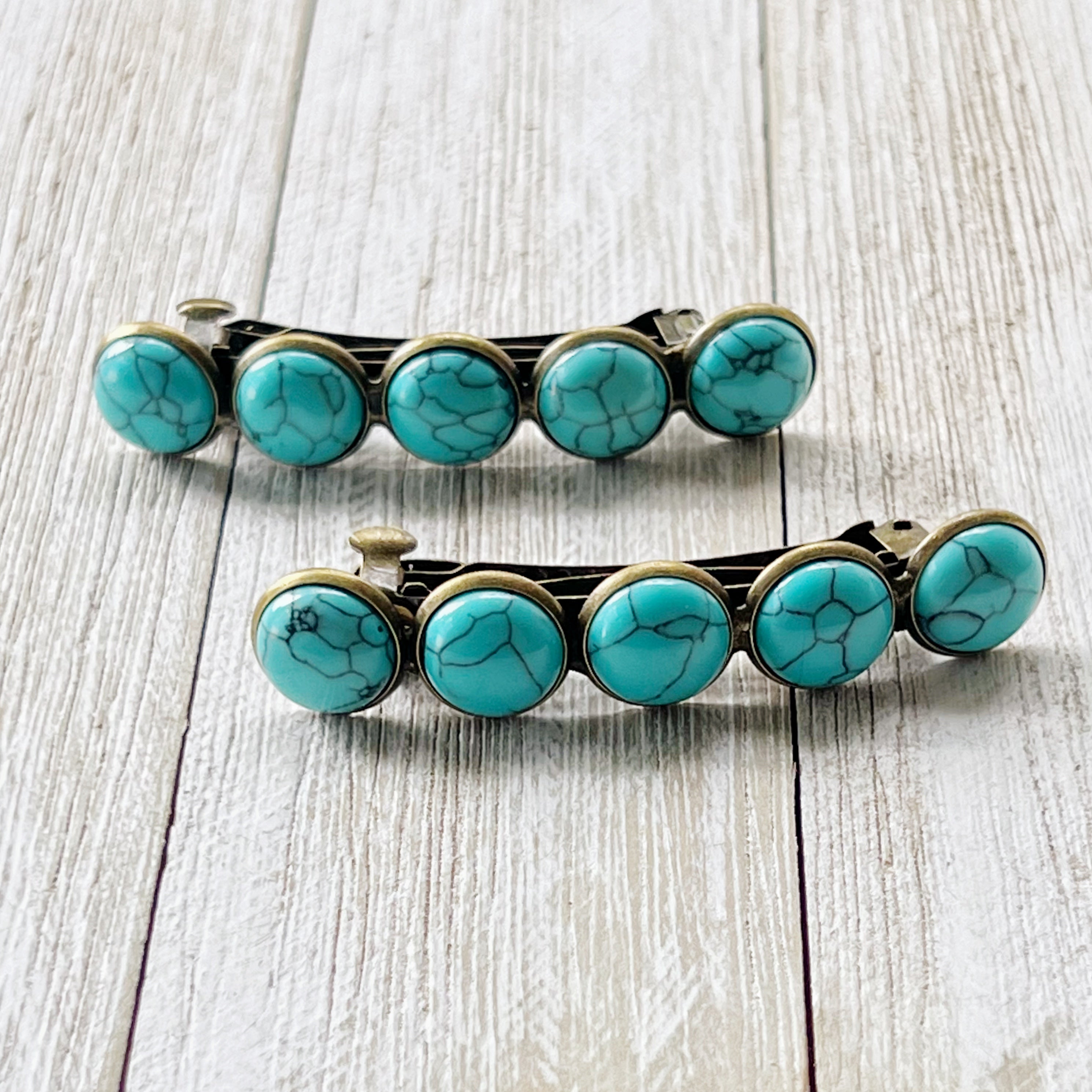 turquoise hair barrettes wood background turquoise hair barrettes wood background